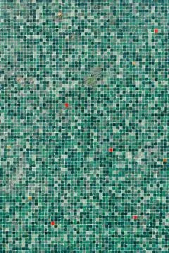 A pattern of green tiles in daylight Stock Photos
