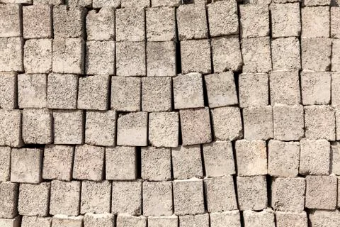 Pattern of grey wall made of concrete bricks Stock Photos