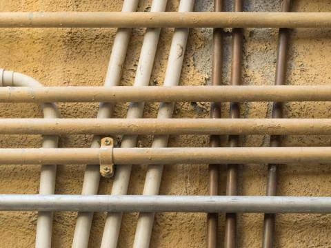 Pattern of a group of crossing and overlapping water pipes Stock Photos