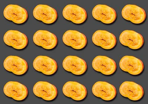 Pattern of half a pumpkin with a shadow on a dark gray background. Foto stock