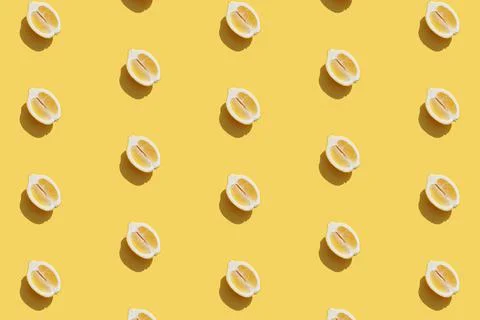 Pattern with halves of lemon collection with shadow on yellow background 스톡 사진
