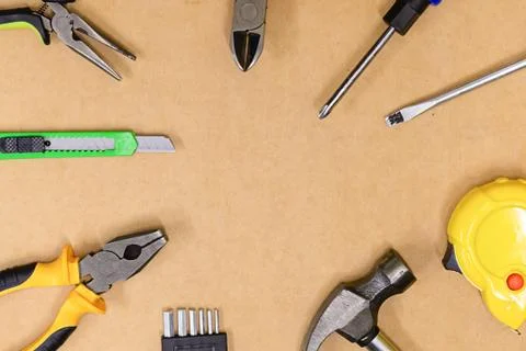 Pattern hand tool pliers screwdriver hammer set builder repairman close-up Stock Photos