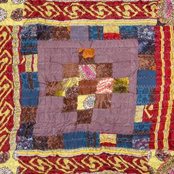 Pattern on handcrafted crinkled patchwork scarf Stock Photos