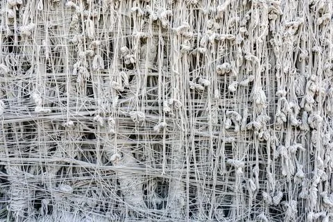 Pattern of holy thread background. Many white tassels made of many tied hol.. Foto stock