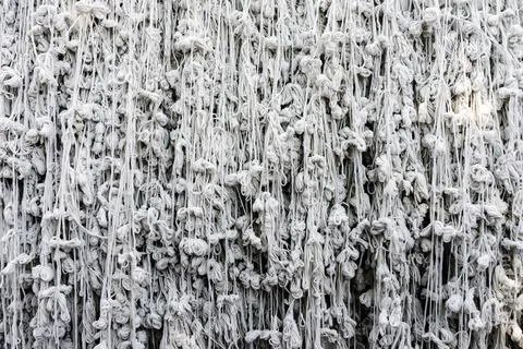 Pattern of holy thread background. Many white tassels made of many tied hol.. Foto stock