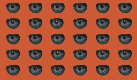 Pattern with a human pupil on a red background. Foto stock