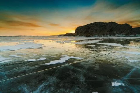 Pattern on ice of lake Baikal during sunset. Siberia Russia Stock Photos