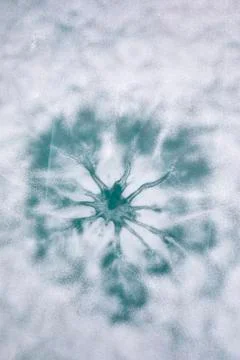 The pattern on the ice in the shape of a flower Stock Photos