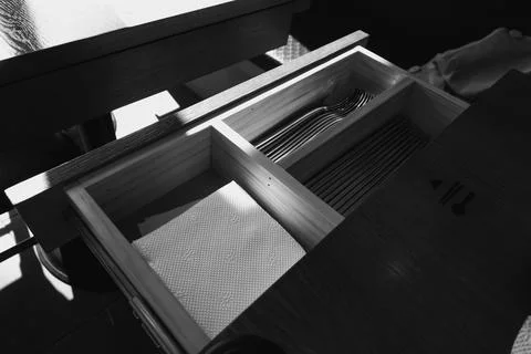 Pattern Imprinted Napkins, Spoons and Chopsticks in a side drawer Stock Photos