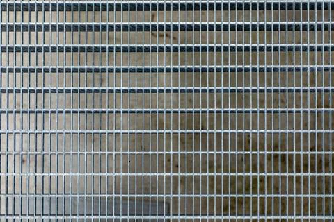 Pattern of iron grid gives a harmoniy technical background Stock Photos