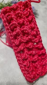 Pattern for knitting a bag. Crocheted from polyester cord. On a gray backgrou Stock Photos