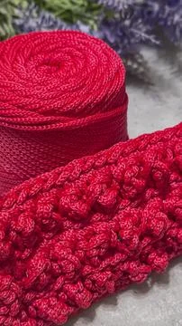 Pattern for knitting a bag. Crocheted from polyester cord. On a gray backgrou Stock Photos