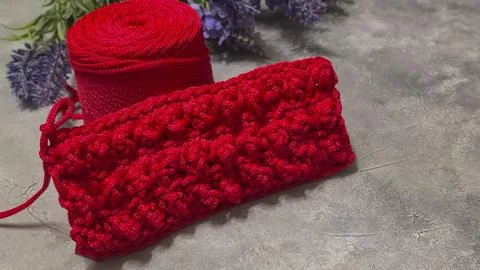 Pattern for knitting a bag. Crocheted from polyester cord. On a gray backgrou Stock Photos
