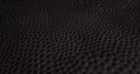 Pattern landscape with many holes to produce wine in volcanic black sand grou Stock Footage 171761082
