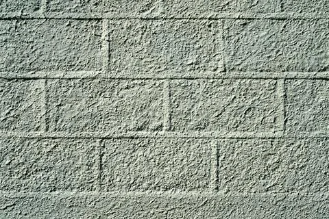 Pattern of large blocks of a block work wall all painted the same colour Stock Photos