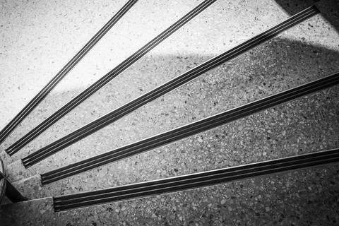 Pattern of light and shadow on the concrete spiral staircase, Background Foto stock