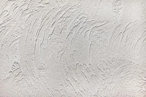 Pattern of light beige decorative and textured plaster. Construction and fini Stock Photos