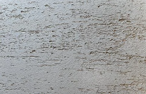 Pattern of light beige decorative and textured plaster. Construction and fi.. Stock Photos