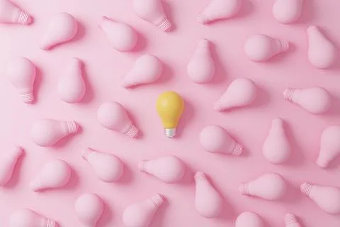 Pattern light bulb yellow outstanding among lightbulb group. Concept of creat Stock Photos