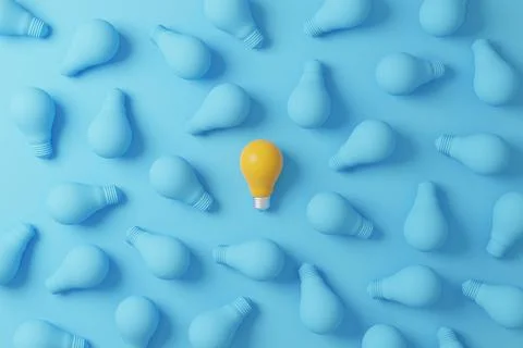 Pattern light bulb yellow outstanding among lightbulb group. Concept of creat Stock Photos