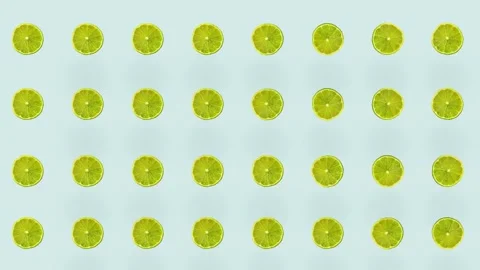 Pattern of limes repeated over colorful background. Top view. Minimal tropical Stock Footage 167477799