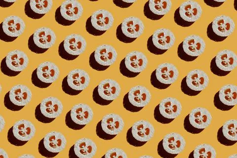 Pattern of loofah sponges on yellow Stock Photos