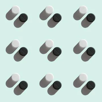 Pattern made of black and white pills Stock Photos