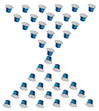 Pattern made of blue no logo new fresh aluminum coffee capsules isolated over Stock Photos