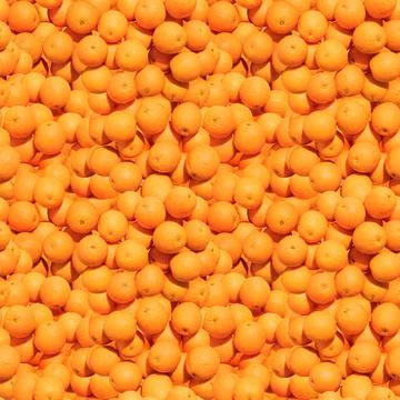 Pattern made from bunch of oranges. Top view, flat design. Healthy food. Stock Photos