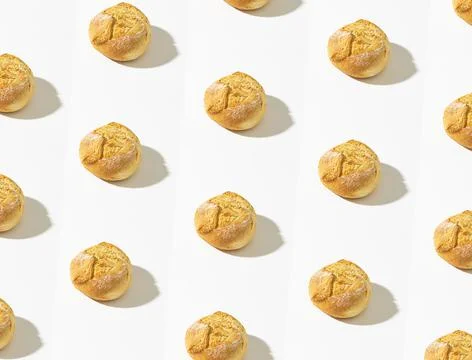 Pattern made with Crusty round bread rolls, known as Kaiser or Vienna rolls Stock Photos