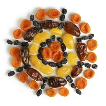 Pattern made from dried fruits on white background Stock Photos