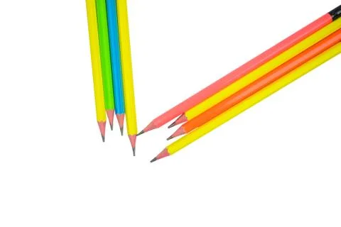 Pattern made with eight different colored wood pencil crayons on white paper Foto stock