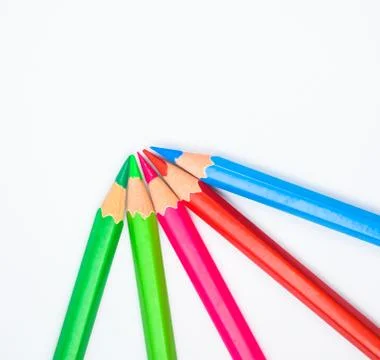 Pattern made with five different colored wood pencil crayons on a paper Stock Photos