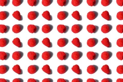 Pattern made of fresh raspberry isolated on white. Stock Photos