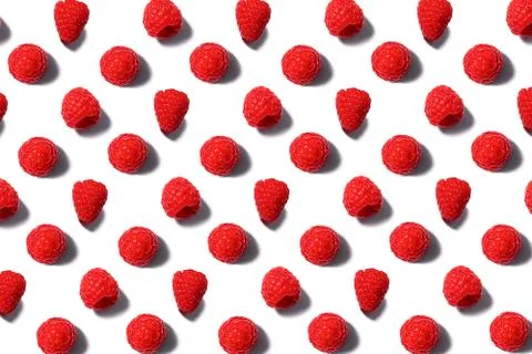 Pattern made of fresh raspberry isolated on white. Stock Photos