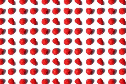 Pattern made of fresh raspberry isolated on white. Stock Photos
