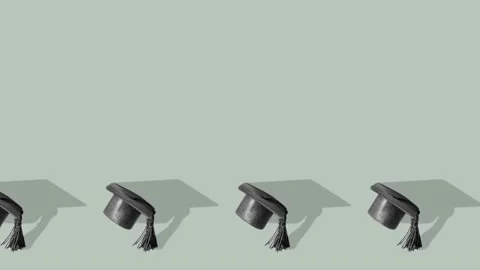 Pattern made from graduated hat on green-grey background. High quality footage Stock Footage 239003537