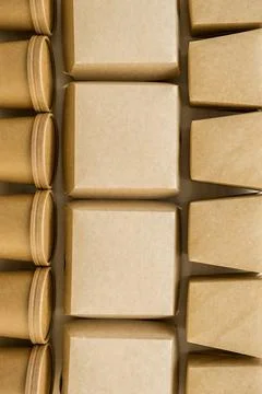 Pattern made of kraft paper or cardboard eco packages Stock Photos