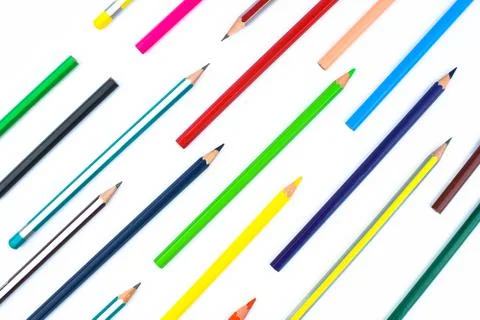 Pattern made with lot of different color pencil crayon on a white background Stock Photos