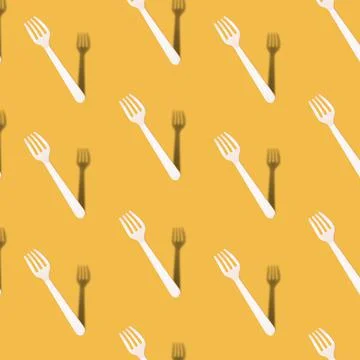Pattern made with many eco friendly wooden fork with trendy shadows on yellow 스톡 사진