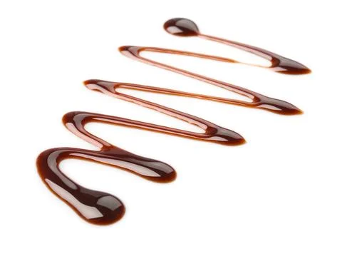 Pattern made of melted chocolate on white background Stock Photos