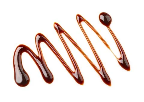 Pattern made of melted chocolate on white background Stock Photos