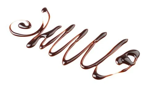 Pattern made of melted chocolate on white background Stock Photos