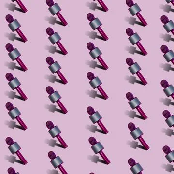 Pattern made with microphones on pink background. Minimal sound concept. 스톡 사진