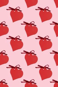 Pattern made of red empty tags in a heart shape. Stock Photos
