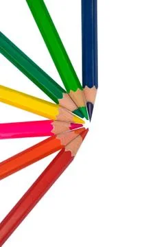 A pattern made with seven different colored wood pencil crayons on a paper Stock Photos