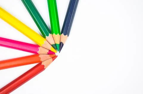 Pattern made with seven different colored wood pencil crayons on a paper Stock Photos