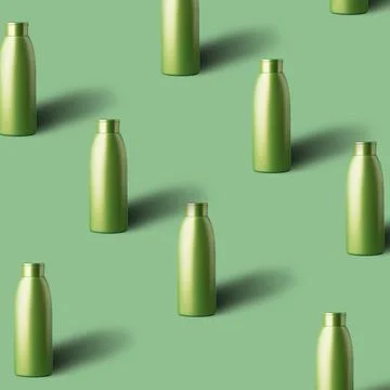 Pattern made with transparent glass bottle with shadow on green pastel backdr Stock Photos