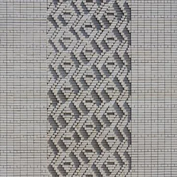 A pattern made of white bricks in the form of diamond shapes. Decoration of t Foto stock