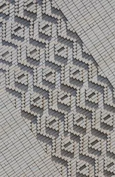 A pattern made of white bricks in the form of diamond shapes. Decoration of t Foto stock